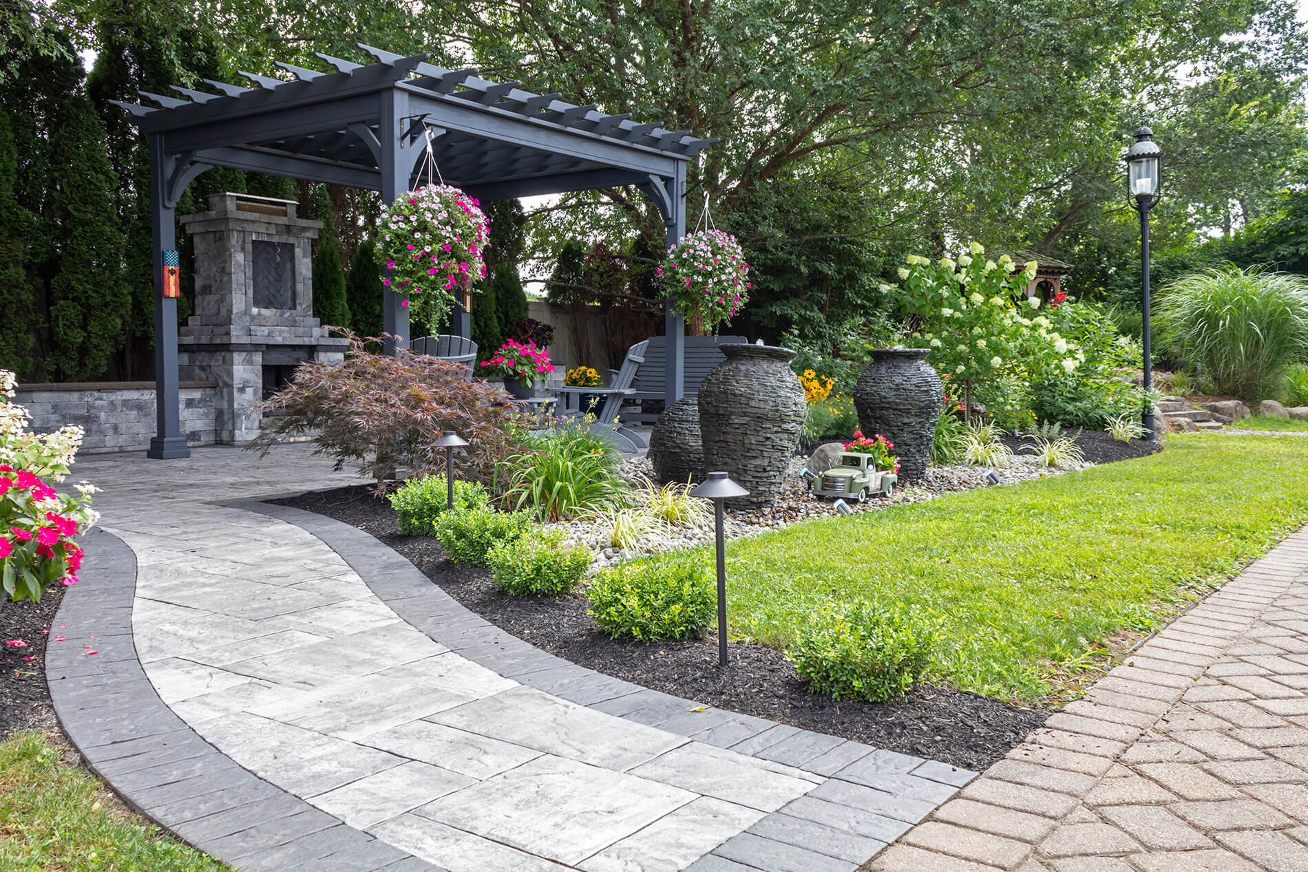 From Deck to Paver Patio: What Sherborn & Natick Homeowners Should Know Before You Replace Your Old Wood Deck